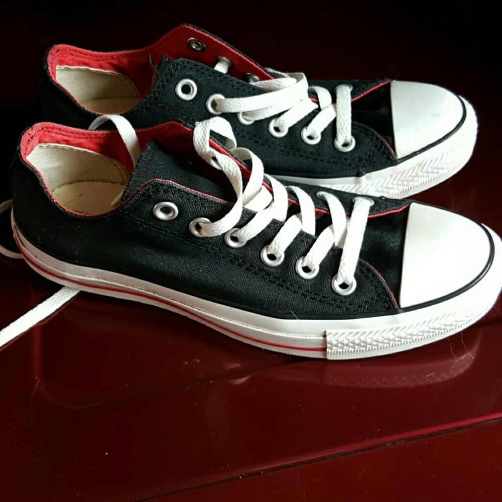 Black and red and white Chuck Taylor Converse